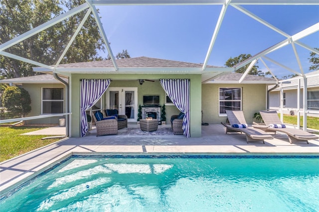 4758 Breezy Pines Blvd, Sarasota, FL 34232 - back of property featuring an outdoor hangout area, stucco siding, a shingled roof, and a patio area