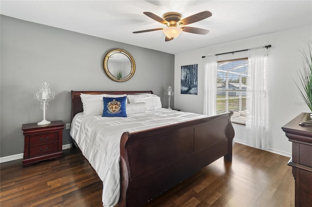 4758 Breezy Pines Blvd, Sarasota, FL 34232 - bedroom featuring dark wood-style floors, baseboards, and a ceiling fan