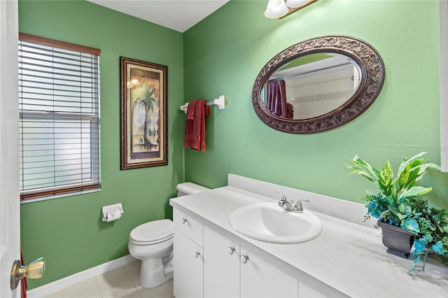4758 Breezy Pines Blvd, Sarasota, FL 34232 - full bathroom with vanity, toilet, baseboards, tile patterned flooring, and a shower with curtain