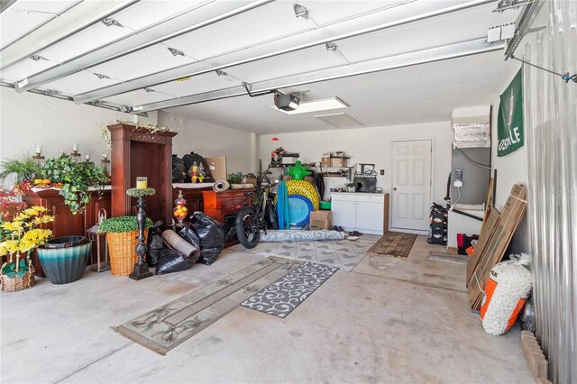 4758 Breezy Pines Blvd, Sarasota, FL 34232 - garage featuring a garage door opener