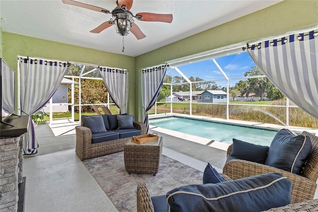 4758 Breezy Pines Blvd, Sarasota, FL 34232 - swimming pool with an outdoor living space, a patio area, glass enclosure, and a ceiling fan