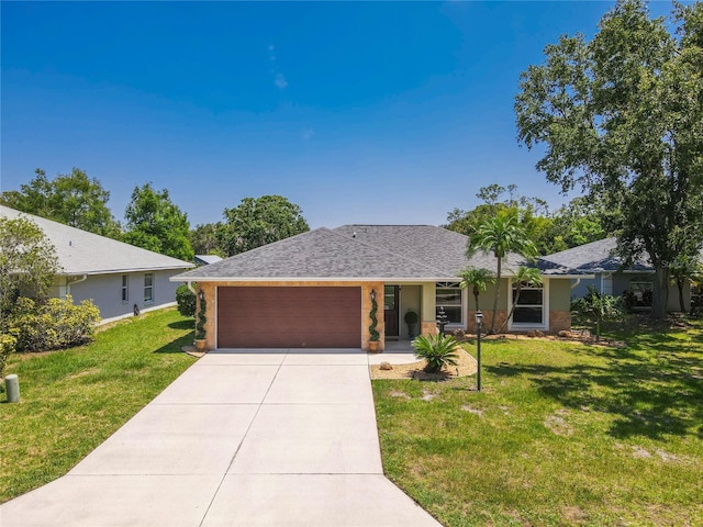 4758 Breezy Pines Blvd, Sarasota, FL 34232 - single story home featuring an attached garage, a front lawn, concrete driveway, a shingled roof, and brick siding