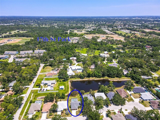 4758 Breezy Pines Blvd, Sarasota, FL 34232 - aerial overview of property's location with a nearby body of water and nearby suburban area