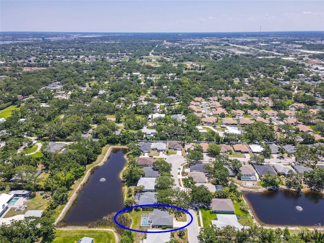 4758 Breezy Pines Blvd, Sarasota, FL 34232 - aerial perspective of suburban area with a nearby body of water