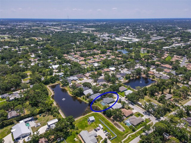 4758 Breezy Pines Blvd, Sarasota, FL 34232 - aerial view of property and surrounding area with a large body of water and nearby suburban area