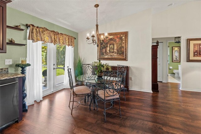 4758 Breezy Pines Blvd, Sarasota, FL 34232 - dining space featuring dark wood-type flooring, a chandelier, and baseboards