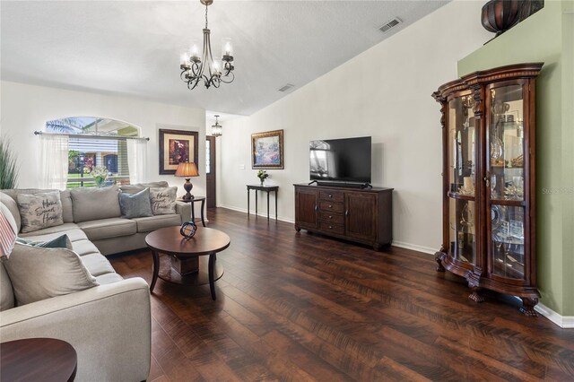 4758 Breezy Pines Blvd, Sarasota, FL 34232 - living room with a chandelier, lofted ceiling, baseboards, and wood finished floors