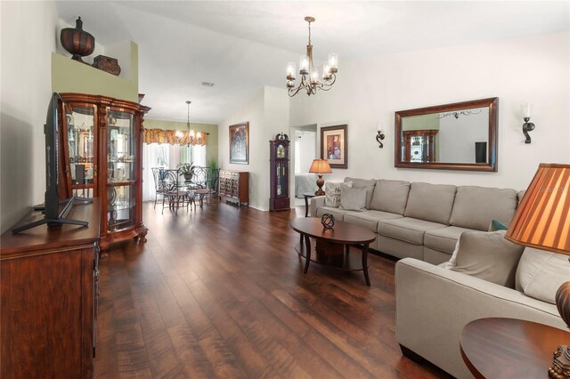 4758 Breezy Pines Blvd, Sarasota, FL 34232 - living room with a chandelier, dark wood finished floors, and lofted ceiling