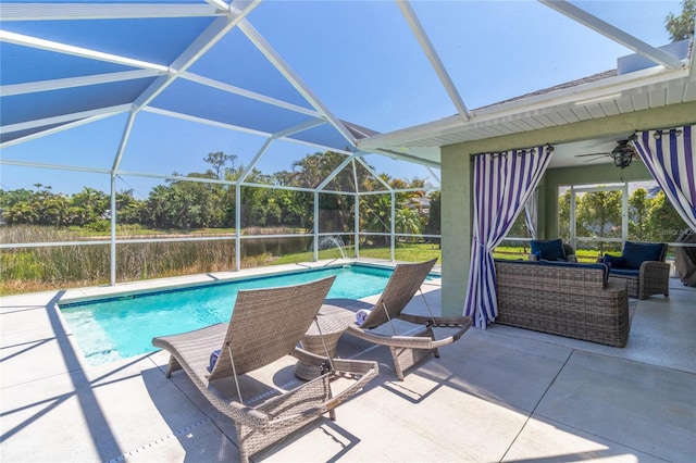 4758 Breezy Pines Blvd, Sarasota, FL 34232 - outdoor pool with a patio, a ceiling fan, glass enclosure, and an outdoor hangout area