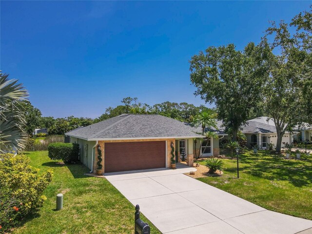 4758 Breezy Pines Blvd, Sarasota, FL 34232 - single story home featuring a front yard, a garage, and driveway