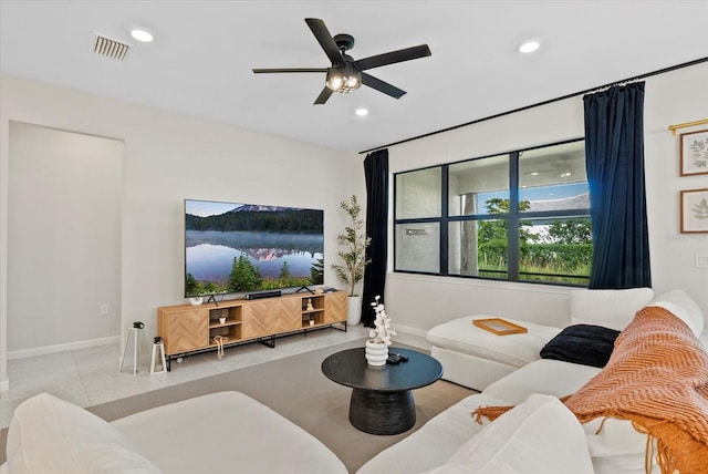 26000 Seastone Dr, Englewood, FL 34223 - tiled living room featuring baseboards, recessed lighting, and ceiling fan