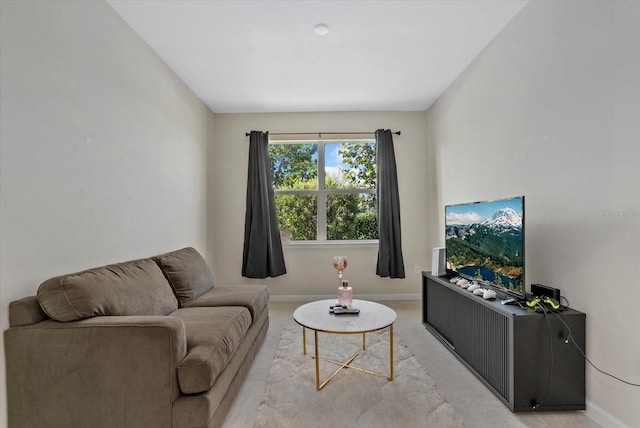 26000 Seastone Dr, Englewood, FL 34223 - living area featuring baseboards and light colored carpet