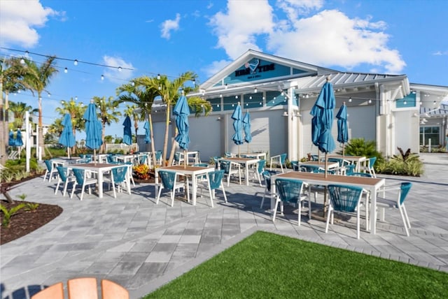 26000 Seastone Dr, Englewood, FL 34223 - view of patio with outdoor dining area