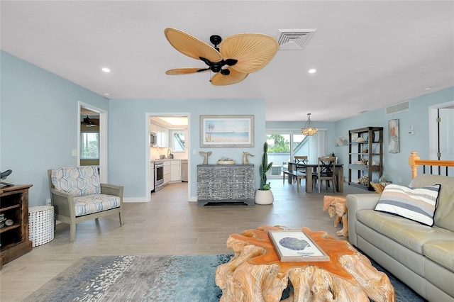 1001 Point Of Rocks Rd Unit 207, Sarasota, FL 34242 - living area featuring recessed lighting and a ceiling fan