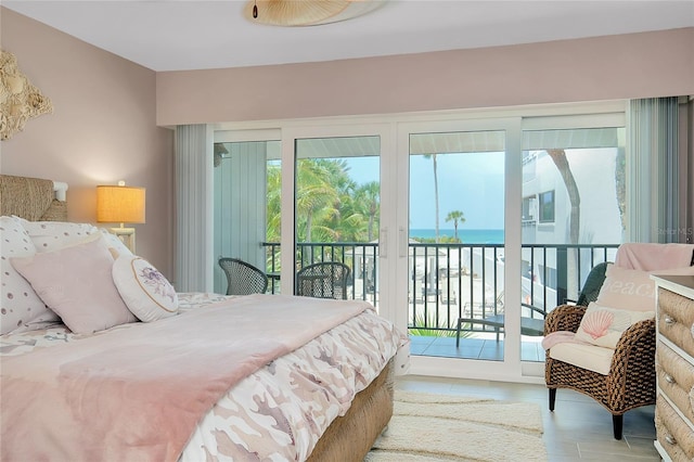 1001 Point Of Rocks Rd Unit 207, Sarasota, FL 34242 - bedroom featuring access to outside and a water view