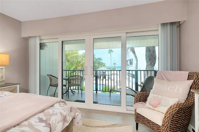 1001 Point Of Rocks Rd Unit 207, Sarasota, FL 34242 - tiled bedroom with access to outside