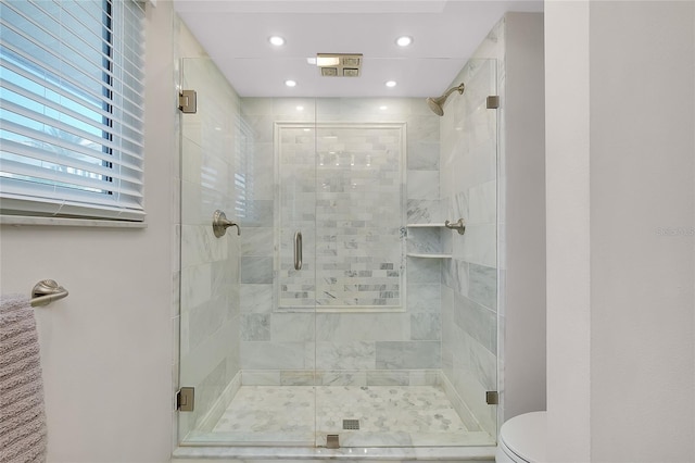 1001 Point Of Rocks Rd Unit 207, Sarasota, FL 34242 - full bathroom featuring toilet, a shower stall, and recessed lighting