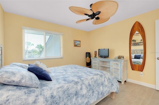 1001 Point Of Rocks Rd Unit 207, Sarasota, FL 34242 - bedroom featuring baseboards and a ceiling fan
