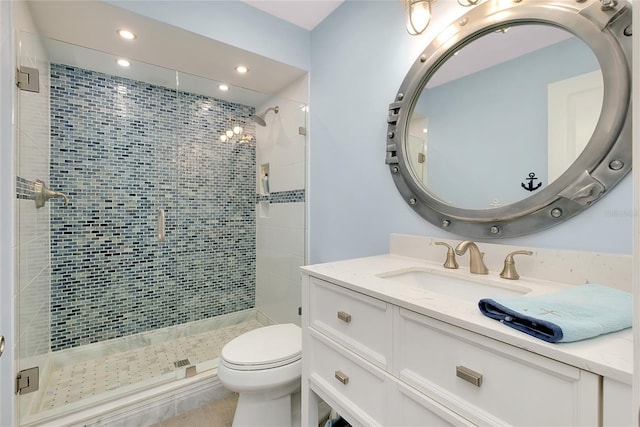 1001 Point Of Rocks Rd Unit 207, Sarasota, FL 34242 - full bath featuring vanity, a stall shower, recessed lighting, and toilet