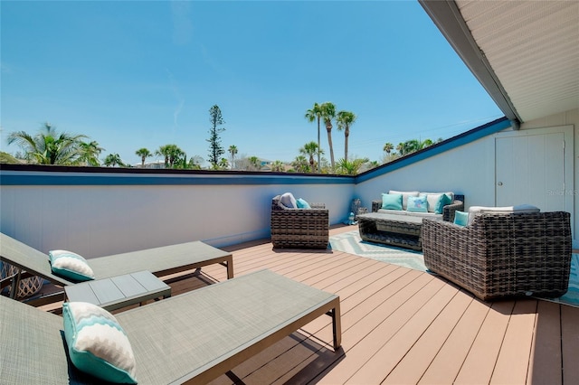 1001 Point Of Rocks Rd Unit 207, Sarasota, FL 34242 - wooden deck with an outdoor hangout area