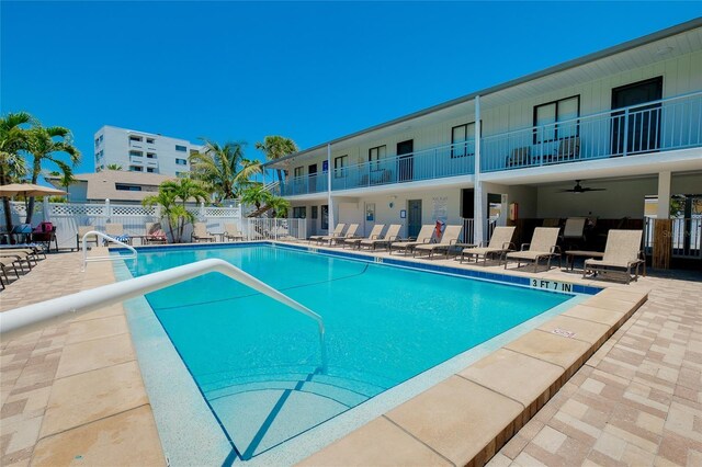 1001 Point Of Rocks Rd Unit 207, Sarasota, FL 34242 - community pool featuring a patio area and a ceiling fan
