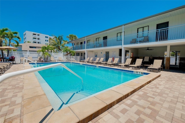 1001 Point Of Rocks Rd Unit 207, Sarasota, FL 34242 - community pool featuring a patio and a ceiling fan