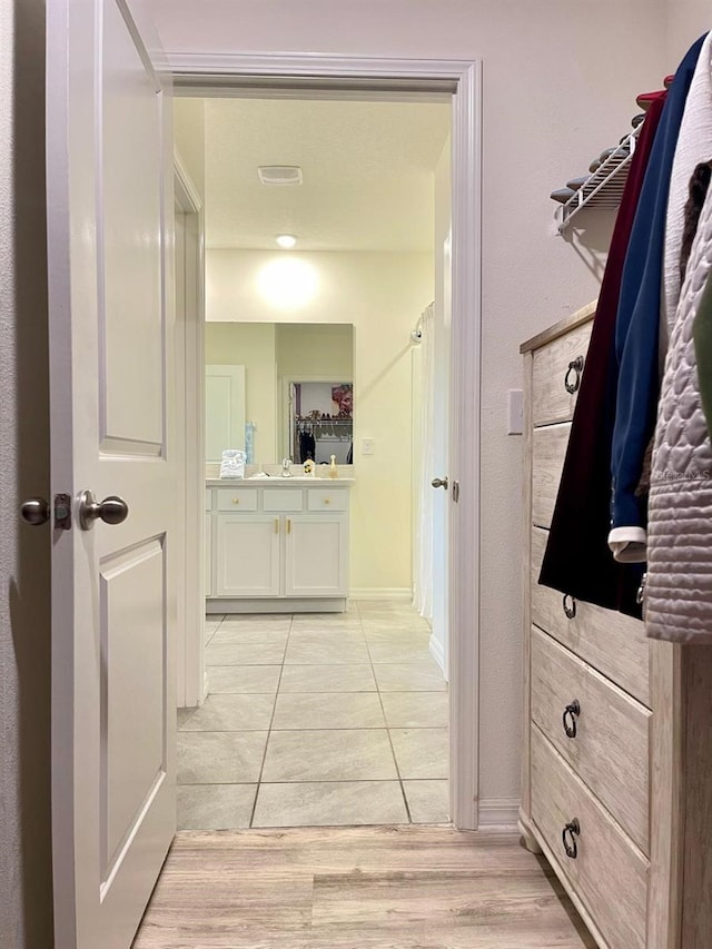 2410 Mizner Bay Ave, Bradenton, FL 34208 - hallway with light tile patterned floors
