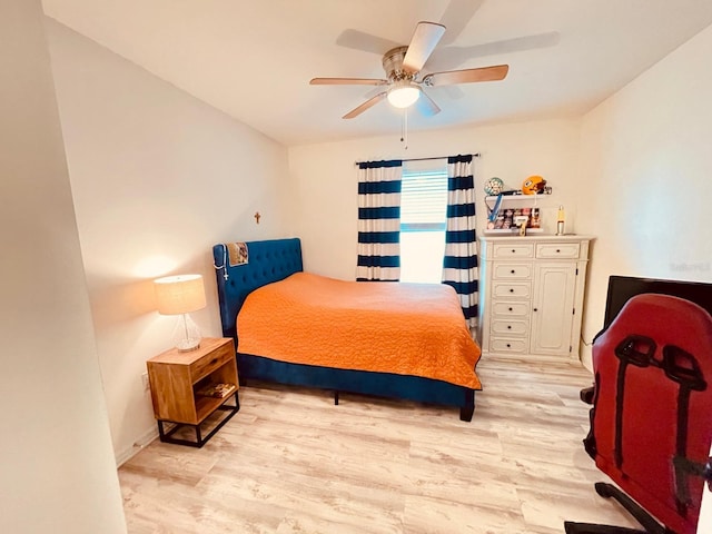 2410 Mizner Bay Ave, Bradenton, FL 34208 - bedroom featuring light wood finished floors, ceiling fan, and baseboards