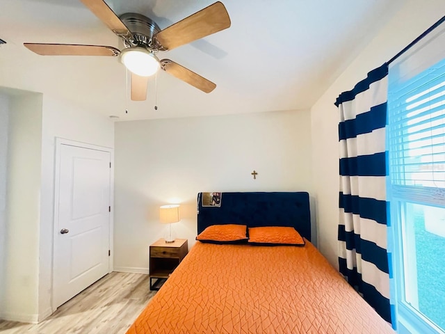 2410 Mizner Bay Ave, Bradenton, FL 34208 - bedroom featuring wood finished floors, a ceiling fan, and baseboards