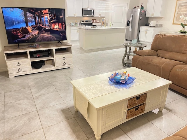 2410 Mizner Bay Ave, Bradenton, FL 34208 - living area featuring light tile patterned floors and baseboards