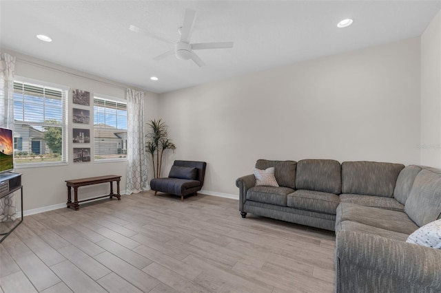 1896 Napoli Dr, Saint Cloud, FL 34771 - living room with light wood-type flooring, a ceiling fan, baseboards, and recessed lighting
