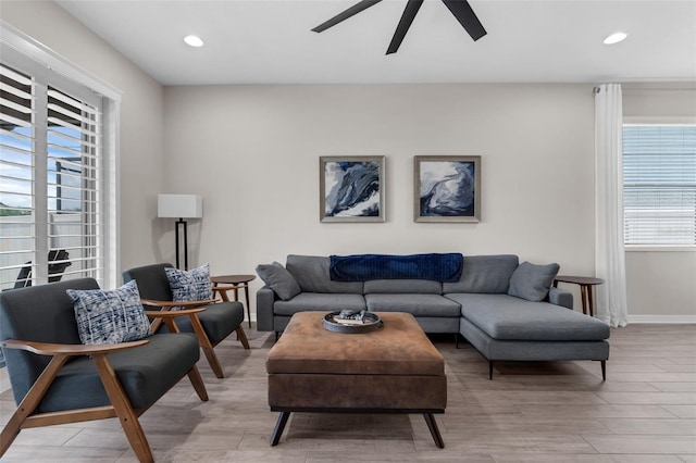 1896 Napoli Dr, Saint Cloud, FL 34771 - living area featuring a ceiling fan, light wood-type flooring, recessed lighting, and baseboards