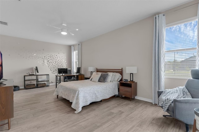1896 Napoli Dr, Saint Cloud, FL 34771 - bedroom featuring light wood-style flooring, baseboards, and a ceiling fan