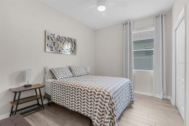 1896 Napoli Dr, Saint Cloud, FL 34771 - bedroom featuring wood finished floors, baseboards, and a ceiling fan