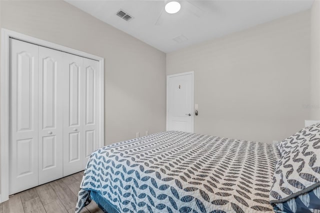 1896 Napoli Dr, Saint Cloud, FL 34771 - bedroom featuring a closet, a ceiling fan, and wood finished floors