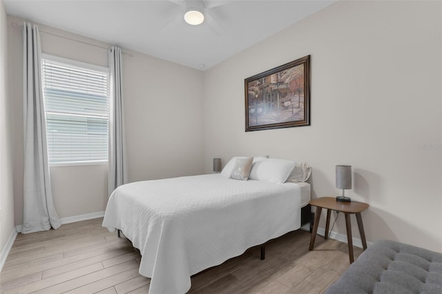 1896 Napoli Dr, Saint Cloud, FL 34771 - bedroom with light wood-type flooring, baseboards, and a ceiling fan