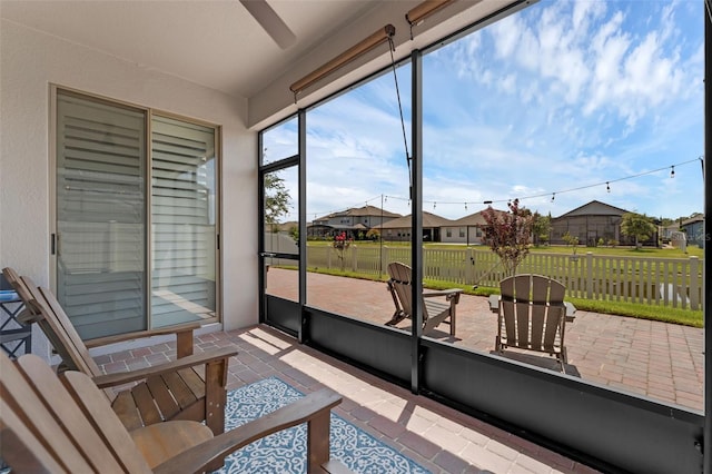 1896 Napoli Dr, Saint Cloud, FL 34771 - sunroom featuring a residential view and lofted ceiling