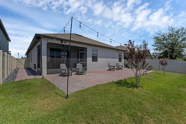 1896 Napoli Dr, Saint Cloud, FL 34771 - back of house featuring stucco siding, a patio, and a sunroom