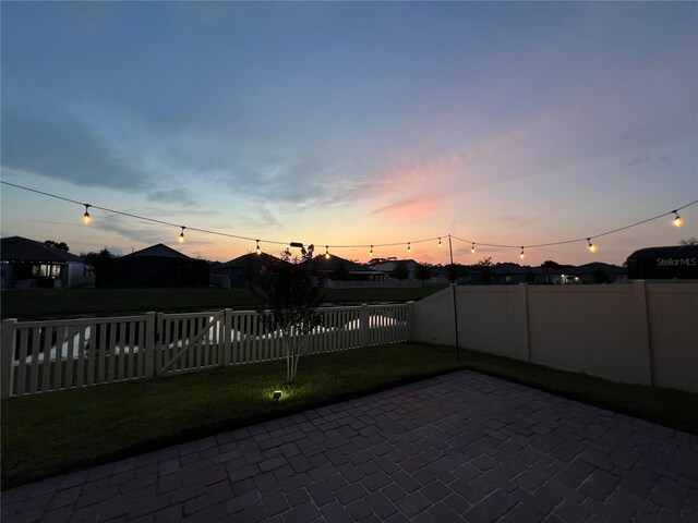 1896 Napoli Dr, Saint Cloud, FL 34771 - patio terrace at dusk with a patio area