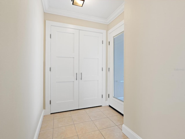 6300 Midnight Pass Rd Unit 5, Sarasota, FL 34242 - foyer entrance featuring baseboards, ornamental molding, and light tile patterned floors