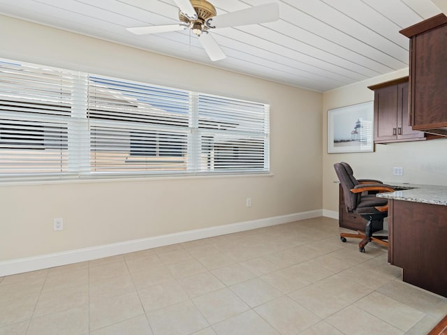 6300 Midnight Pass Rd Unit 5, Sarasota, FL 34242 - home office with ceiling fan, baseboards, and light tile patterned floors