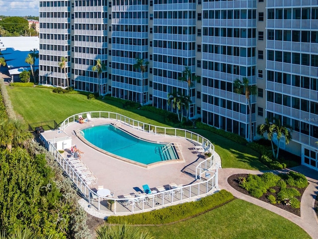 6300 Midnight Pass Rd Unit 5, Sarasota, FL 34242 - community pool featuring a yard and a patio