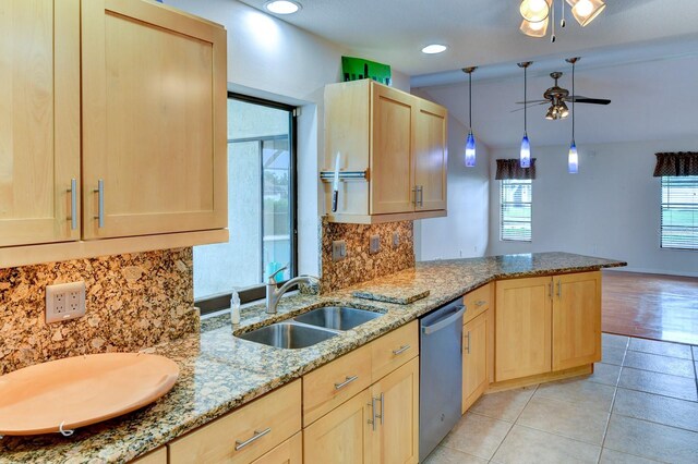 8402 13th Ave NW, Bradenton, FL 34209 - kitchen featuring light brown cabinets, a sink, ceiling fan, stainless steel dishwasher, and tasteful backsplash