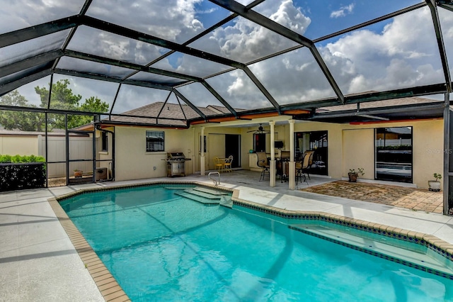 8402 13th Ave NW, Bradenton, FL 34209 - outdoor pool with a patio area, a grill, and a ceiling fan