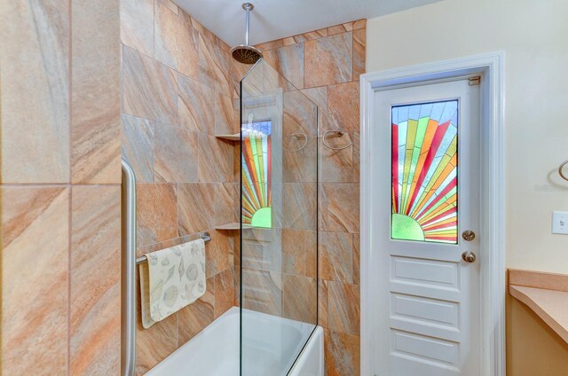 8402 13th Ave NW, Bradenton, FL 34209 - bathroom featuring a combined bath / shower with rainfall shower and vanity