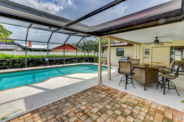 8402 13th Ave NW, Bradenton, FL 34209 - view of swimming pool with a patio, ceiling fan, and glass enclosure