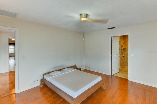 8402 13th Ave NW, Bradenton, FL 34209 - bedroom with wood finished floors and baseboards