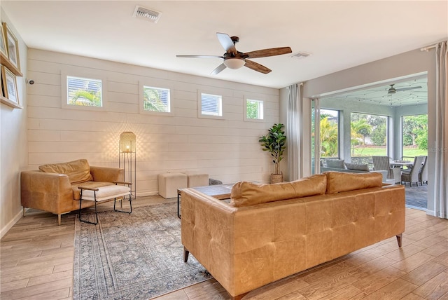 11502 Golden Bay Pl, Bradenton, FL 34211 - living area with ceiling fan and light wood finished floors