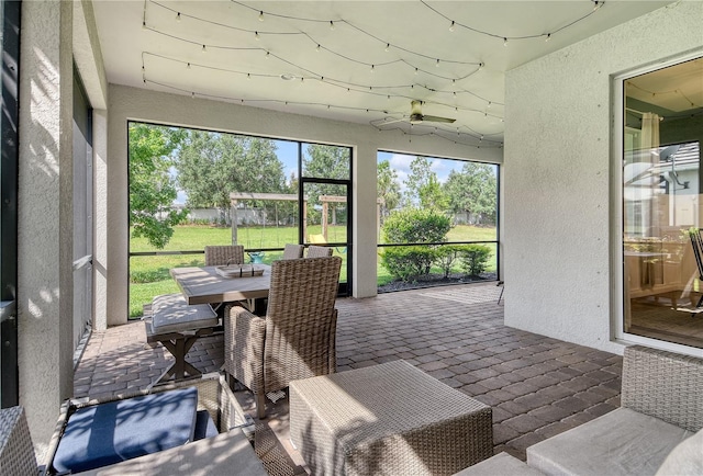 11502 Golden Bay Pl, Bradenton, FL 34211 - sunroom / solarium with outdoor dining area