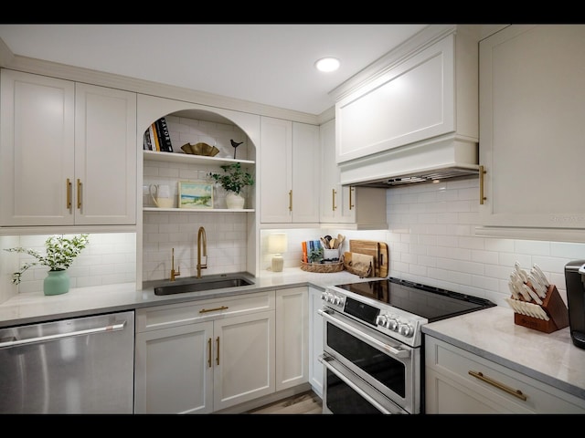 2045 Gulf Of Mexico Dr Unit M1-505, Longboat Key, FL 34228 - kitchen featuring appliances with stainless steel finishes, a sink, white cabinets, and recessed lighting